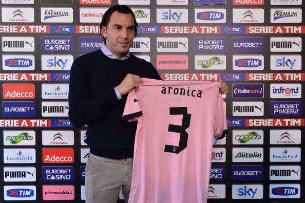 PALERMO, ITALY - JANUARY 02:  Salvatore Aronica poses with his new team shirt during his presentation as new player of Palermo at Tenente Carmelo Onorato Sports Center on January 2, 2013 in Palermo, Italy.  (Photo by Tullio M. Puglia/Getty Images)